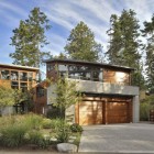 Concrete Courtyard Ornamental Freshening Concrete Courtyard With Colorful Ornamental Plants And Stone Path In Front Of Modern Sunset Point House Dream Homes Sustainable Contemporary Home With Wood And Stained Glass Facade