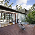 Gray Modular And Glorious Gray Modular Outdoor Table And Perforated Chairs Installed On Wooden Striped Floor Outside Storrs Road Residence Decoration Amazing Floating Deck Concept For Luminous Modern House