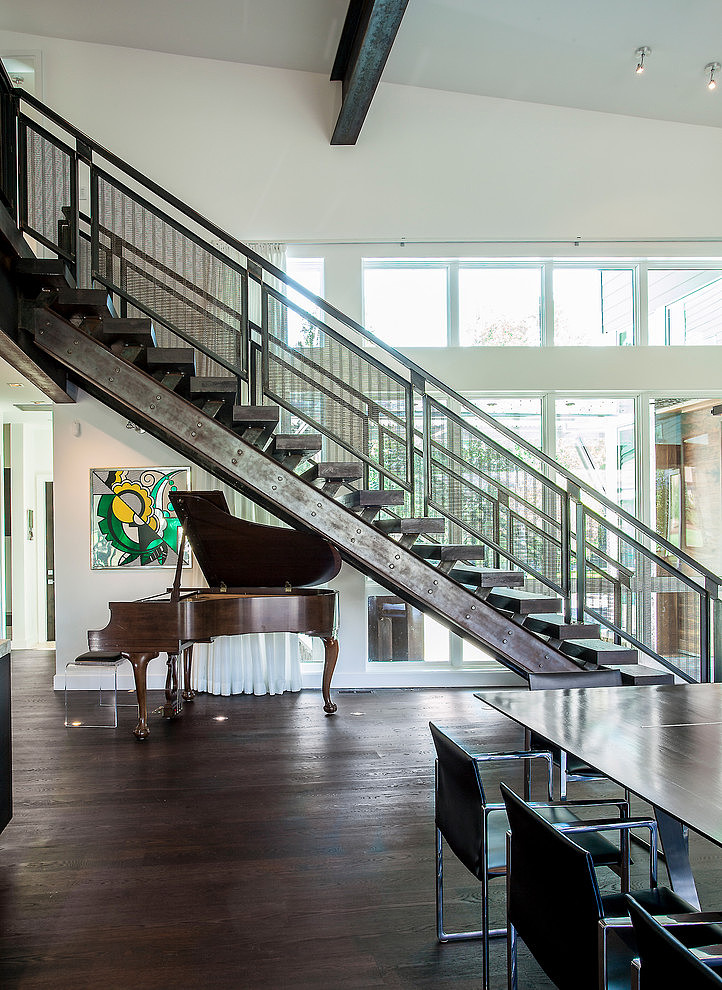 Brown Painted Placed Gorgeous Brown Painted Grand Piano Placed Under Wooden Stairs In Park City Residence Jaffa Group Dream Homes Captivating Home Design With Grey Exterior Surrounded By Green Lawn