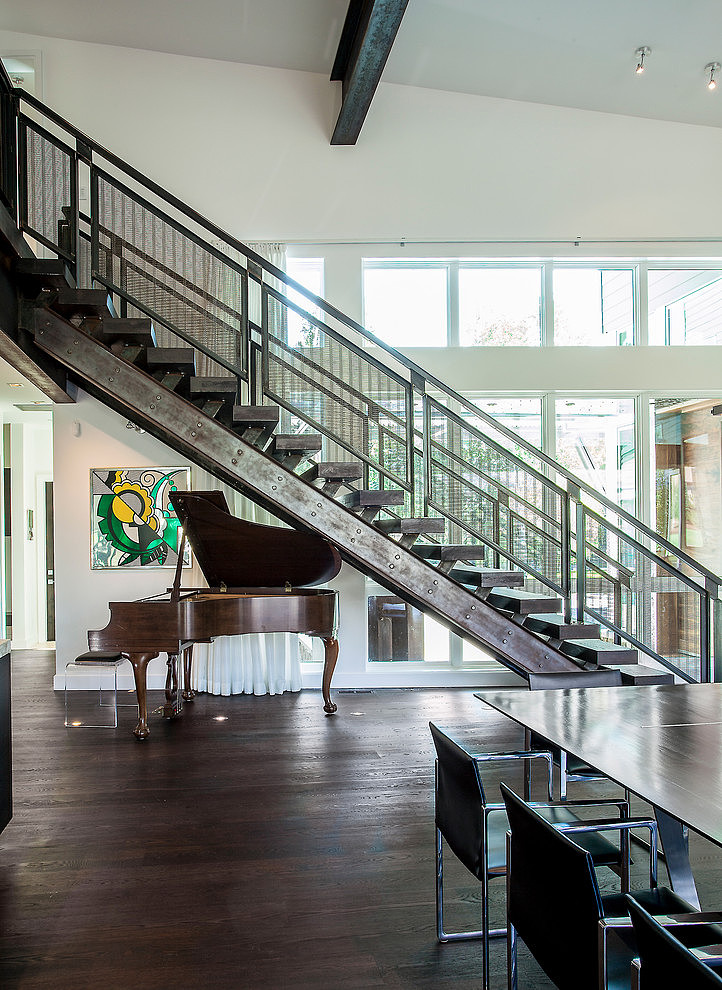 Brown Painted Placed Gorgeous Brown Painted Grand Piano Placed Under Wooden Stairs In Park City Residence Jaffa Group Dream Homes  Captivating Home Design With Grey Exterior Surrounded By Green Lawn