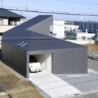 Facade Look Modern Gorgeous Facade Look Of The Modern House With Unique Modern Garage Space Grey Wall And Grey Roof Dream Homes Stunning Contemporary Hillside Home With Open Garage Concepts