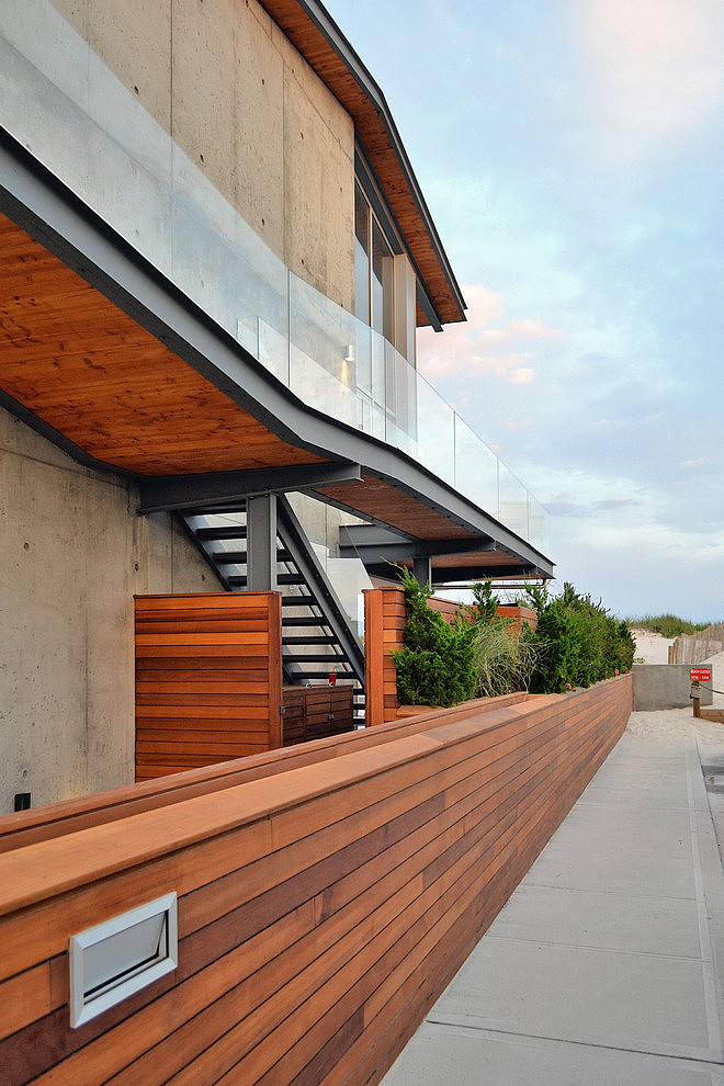 Long Island Exterior Gorgeous Long Island Beach House Exterior With Wooden Fence And Concrete Walkway Shown Also Outdoor Staircase Dream Homes Elegant Contemporary Beach House With Stylish Interior Decorations