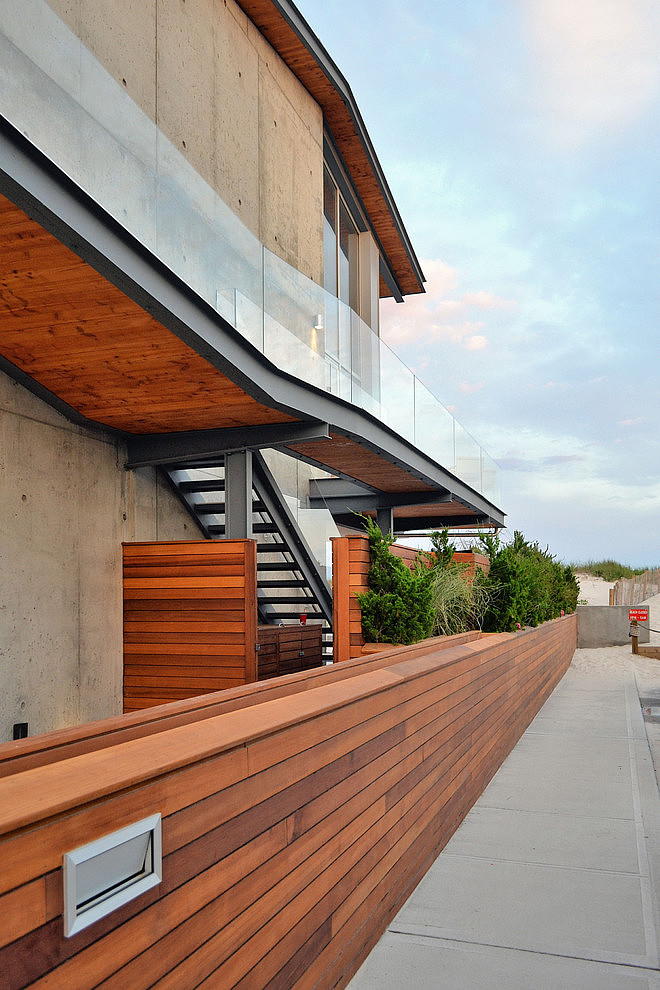 Long Island Exterior Gorgeous Long Island Beach House Exterior With Wooden Fence And Concrete Walkway Shown Also Outdoor Staircase Dream Homes  Elegant Contemporary Beach House With Stylish Interior Decorations