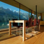 Meeting Space Wohnhaus Gorgeous Meeting Space Design Of Wohnhaus Am Walensee Residence With Dark Brown Chairs Which Have Silver Feet Made From Stainless Steel Architecture Beautiful Rectangular Lake Home With Wood And Concrete Elements