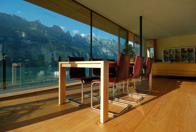 Meeting Space Wohnhaus Gorgeous Meeting Space Design Of Wohnhaus Am Walensee Residence With Dark Brown Chairs Which Have Silver Feet Made From Stainless Steel Architecture  Beautiful Rectangular Lake Home With Wood And Concrete Elements