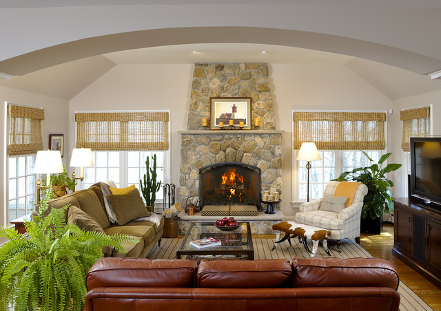Stone Cladded Artistic Gorgeous Traditional Stone Clad  Fireplace With Artistic Overmantle Set As Vital Point In Living Room With Red Sofas Decoration Bright And Cheerful Home Decorating With Beautiful Sofa Furniture
