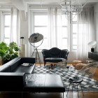 Industrial Living Leather Gravy Industrial Living Room With Leather Black Sofas Under The Transparency Pendant Lamps Which Add Stylish The Room Decoration Dramatic Yet Elegant Bold Black Sofas For Exquisite Interior Decorations