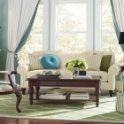 Traditional Living With Impressive Traditional Living Room Design With White Colored Classic Sofa And Dark Brown Wooden Table Decoration Classic Contemporary Sofas For A Living Room Arrangements