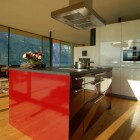 Kitchen Design Am Incredible Kitchen Design Of Wohnhaus Am Walensee Residence With Dark Brown Kitchen Island Which Has Grey Surface Made From Marble Architecture Beautiful Rectangular Lake Home With Wood And Concrete Elements