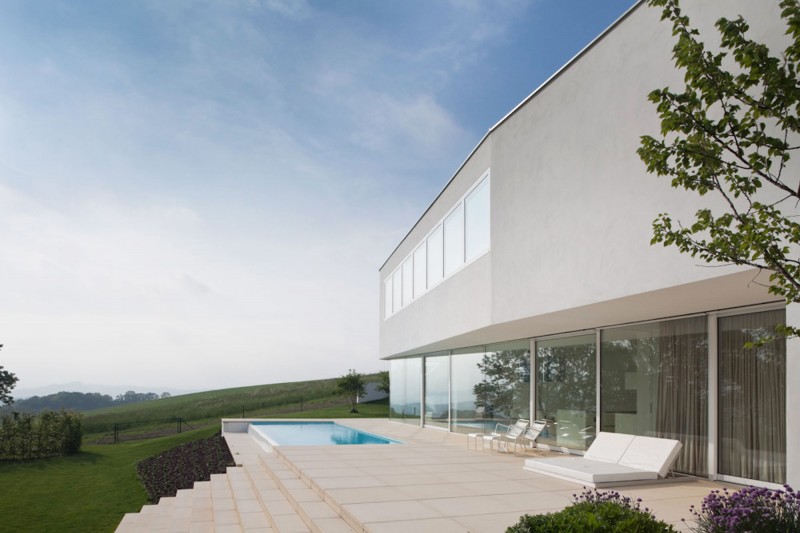 Small Blue In Incredible Small Blue Swimming Pool In The Backyard Of The House L Residence Beautified With Blue Sky Views Decoration Simple Home Design With Transparent Glass Wall And Bright Interiors