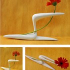 Shape Of White Innovative Shape Of The Stunning White Vase Flower With A Red Flower On The Wooden Floor Decoration Creative Flower Vase To Adorn Your Contemporary Homes