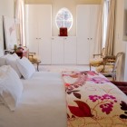 Floral Patterned Colour Inspiring Floral Patterned Duvet Full Color Installed In Eclectic Bedroom Involved White Wooden Dresser On Cream Painted Wall Bedroom Multicolored Duvet Cover Sets With Various Color Appearances