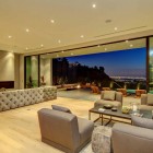 White Gray Installed Inspiring White Gray Tufted Sofas Installed With Fireplace On White Brown Painted Wall And Yellow Wall Art For Spectacular Views Over Los Angeles Dream Homes Fascinating Contemporary House With Spectacular City Scenery