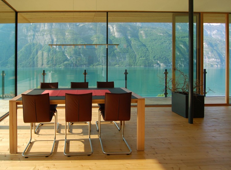 Meeting Space Wohnhaus Interesting Meeting Space Design Of Wohnhaus Am Walensee Residence With Several Dark Brown Chairs Surrounding Soft Brown Wooden Table Architecture Beautiful Rectangular Lake Home With Wood And Concrete Elements