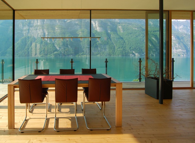 Meeting Space Wohnhaus Interesting Meeting Space Design Of Wohnhaus Am Walensee Residence With Several Dark Brown Chairs Surrounding Soft Brown Wooden Table Architecture  Beautiful Rectangular Lake Home With Wood And Concrete Elements