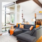 Midcentury Living With Interesting Mid Century Living Room Design With Dark Grey Colored Sofas Baratos Several Orange Pillows And White Colored Rug Carpet Decoration Fabulous Sofas Baratos As Decor Accents For Elegant House Interior Look