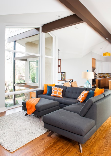 Midcentury Living With Interesting Mid Century Living Room Design With Dark Grey Colored Sofas Baratos Several Orange Pillows And White Colored Rug Carpet Decoration  Fabulous Sofas Baratos As Decor Accents For Elegant House Interior Look