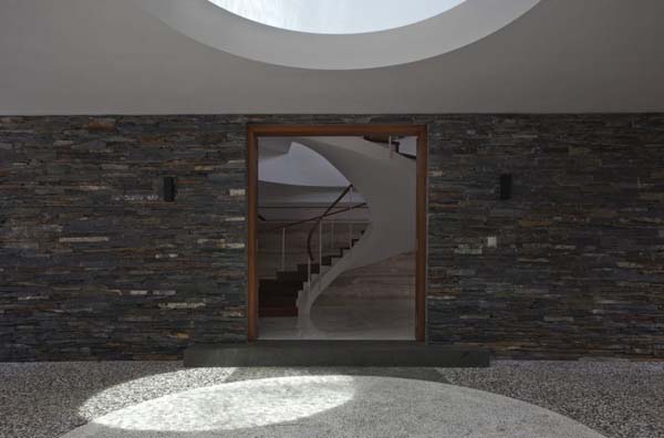 Circular Staircase Water Inviting Circular Staircase Installed Inside Water Cooled House Building Displayed Through Framed Glass Window Decoration Elegant And Beautiful Home Design Presented By The Water-Cooled House