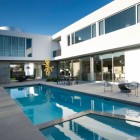 Blue Pool Modern Long Blue Pool In The Modern Family Residence Courtyard With Open Dining Space And Iron Chairs Dream Homes Duplex Contemporary Concrete Home With Outdoor Green Gardens For Family