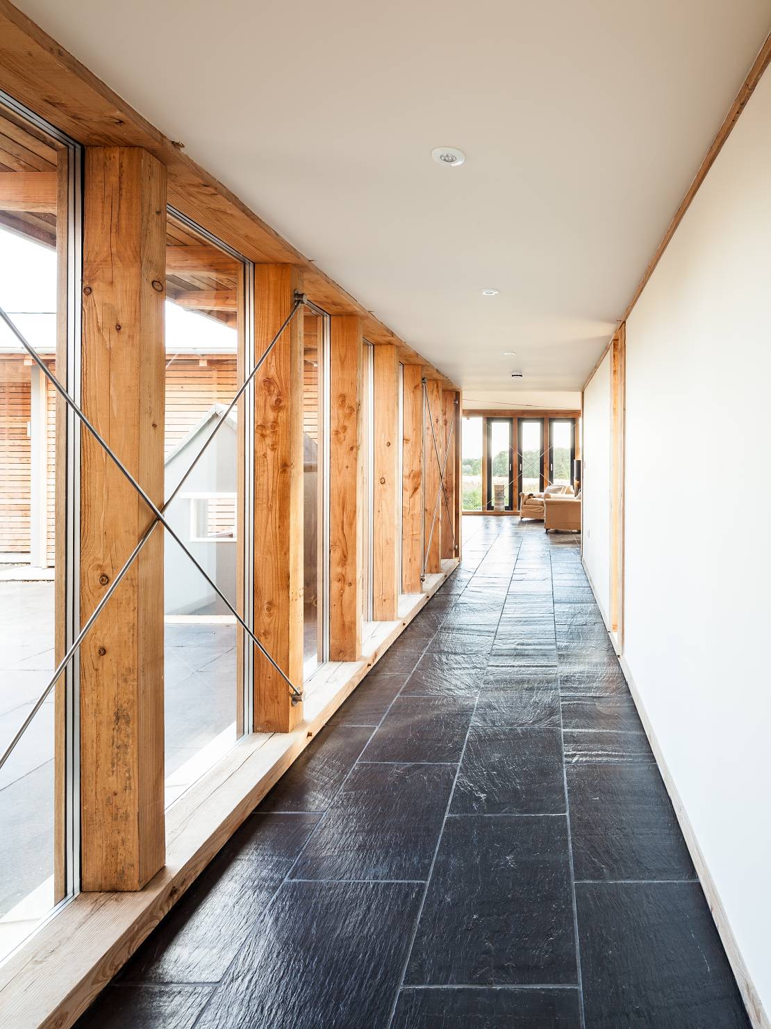 Hallway Design Farmhouse Long Hallway Design At Allies Farmhouse Applied Black Tile Floor Large Glass Window Design Framed By Wood Dream Homes  Stunning Rustic Contemporary Home With Bright Interior Accents