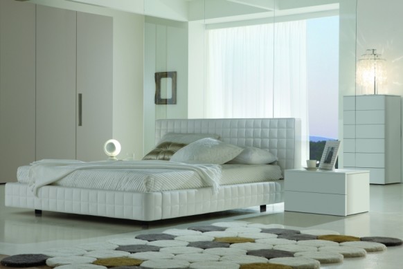 All White Which Luxurious All White Interior Bedroom Which Furnished With Modern White Leather Bed With Playful Carpet Design Bedroom  15 Neutral Modern Bedroom Decoration In Stylish Interior Designs