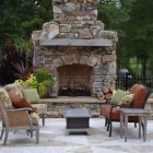 Outdoor Fireplace Wooden Magnificent Outdoor Fireplace Designs Facing Wooden Table Between Chairs That Stones Decoration Make Robust The Building Decoration Classic Outdoor Fireplace Designs For Impressive Exterior Decoration