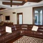 Mediterranian Family Dark Marvelous Mediterranean Family Room With Dark Brown Colored Leather Sectional Sofa Several White Pillows And Dark Brown Wooden Pergola Decoration 20 Brilliant Leather Sectional Sofas That Will Fit Stunningly Into Your Family Home