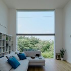 White Wooden With Mesmerizing White Wooden Windows Completed With White Sofas And White Open Cabinets With White Interior Design In Hiyoshi Residence Architecture Beautiful Minimalist Home Decorating In Small Living Spaces
