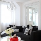 Living Room Sectional Modern Living Room With Black Sectional Sofa And Glass Top Round Coffee Table Also Crystal Chandelier Furniture Casual Black Sectional Sofas For Every Style Of Modern Interior