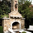 Outdoor Fireplace Stone Nice Outdoor Fireplace Designs With Stone Bricks Wall Facing White Table And Chairs Also Feat Planter Decoration Classic Outdoor Fireplace Designs For Impressive Exterior Decoration