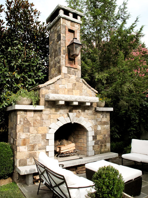 Outdoor Fireplace Stone Nice Outdoor Fireplace Designs With Stone Bricks Wall Facing White Table And Chairs Also Feat Planter Decoration  Classic Outdoor Fireplace Designs For Impressive Exterior Decoration