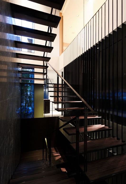 Stairs In Colored Opulent Stairs In Zigzag Style Colored In Black Put At The Edge Of The Room In The Japanese Rural Homes By Kidosaki Architects Architecture  Beautiful Modern Japanese Home Covered By Glass And Wooden Walls