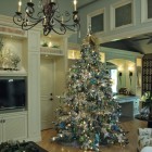 Designer Christmas In Pretty Designer Christmas Tree Ornaments In Modern Living Room Classy Chandelier Sophisticated TV Floral Print Sofa Round Table Decoration Beautiful Christmas Tree Ornaments The Holy Greenery And Stunning Elements