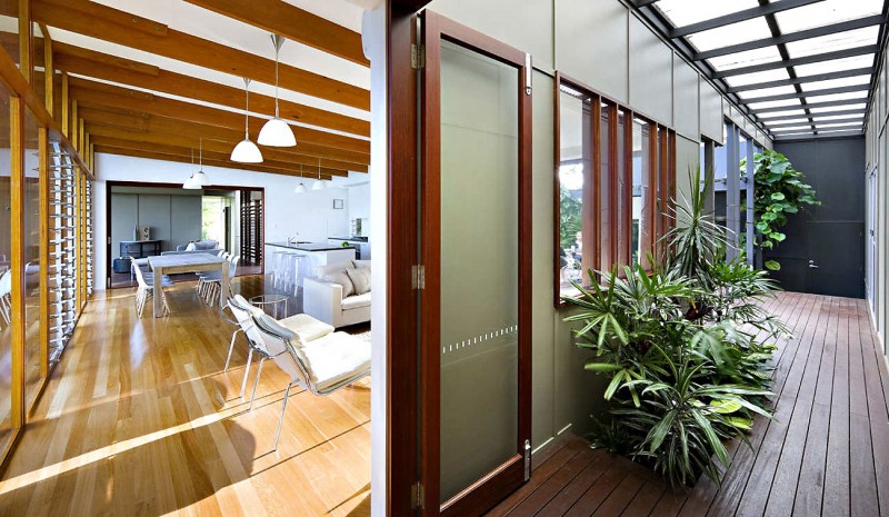 Plants On In Refreshing Plants On Pot Installed In Empty Space Of Storrs Road Residence With Wooden Striped Floor Involved Wood Glass Door Decoration  Amazing Floating Deck Concept For Luminous Modern House