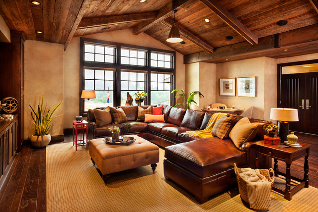 Rustic Family With Remarkable Rustic Family Room Design With Dark Brown Colored Leather Sectional Sofa And Bright Cream Colored Floor Mat Decoration  20 Brilliant Leather Sectional Sofas That Will Fit Stunningly Into Your Family Home