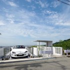 Kenji Yanagawa House Sensational Kenji Yanagawa Case Study House With Splendid Mountainous View Strategic Parking Area With White Railing White Canopy Dream Homes Stunning Contemporary Hillside Home With Open Garage Concepts