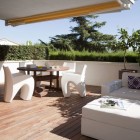 White Contemporary Spain Sensational White Contemporary Home In Spain Design In Terrace Decorated With Wooden Deck Flooring And White Outdoor Furniture Decoration Dream Homes Bright Home Interior Decoration Using White And Beautiful Wooden Accents