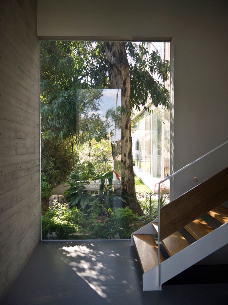 Glass Windows Gray Simple Glass Windows On The Gray Painted Wall Beside Wooden Constructed Ladder In Gray Floor Of Casa ER2 Residence Kitchens Spectacular Home Exterior With Unique Outdoor Wall Decorations