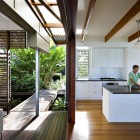 Modular Pendant Kitchen Simple Modular Pendant Light Above Kitchen Island On Wood Glossy Floor Installed In Storrs Road Residence With Wood Perforated Drapes Decoration Amazing Floating Deck Concept For Luminous Modern House