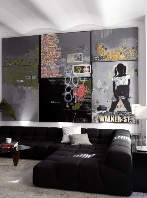 Industrial Living Applied Sleek Industrial Living Room Design Applied Black Sectional Sofa And Round Glass Coffee Table With Graffiti Wall Decal Furniture Casual Black Sectional Sofas For Every Style Of Modern Interior