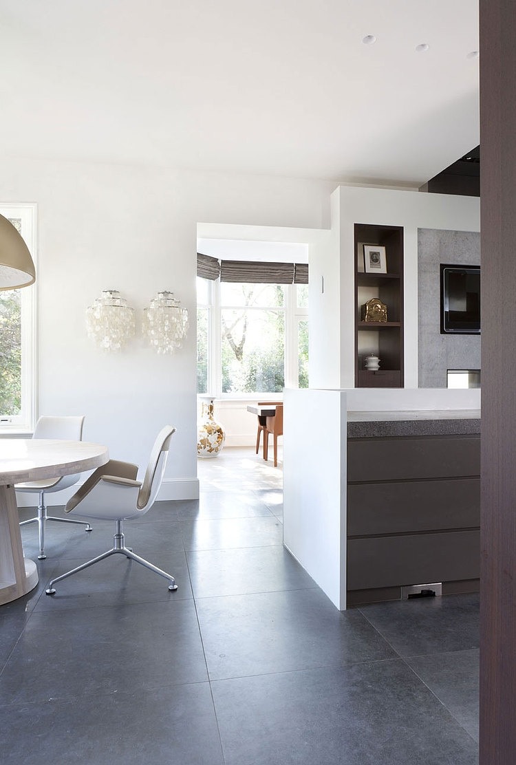 Kitchen And Design Sleek Kitchen And Dining Nook Design At Manor River Remy Meijers With Circular Dining Table And Concrete Tile Floor Decoration  Dazzling Glossy Furniture In Bright And Elegant House Interiors