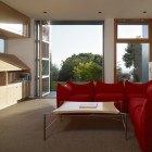 Red Sofas Room Sleek Red Sofas In Living Room Area With Math Table Design That Wooden Wardrobe Beside Glass Door Opened Decoration Vibrant Red Sofas Inspirations To Give Your Living Room A Trendy
