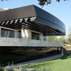 Style Of Spanish Smart Style Of Curved Structure Spanish Home Clad In Stone Wall Construction With Glass Facades And Fences In Two Story House Dream Homes Spanish Home Design With Futuristic And Elegant Cantilevered Decorations