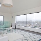 White Living The Spacious White Living Room Of The Water Tower Residence With Modular Pendant Above White Sofa And Glass Coffee Table Dream Homes An Old Water Tower Converted Into A Luminous Modern Home With Sliding Glass Walls