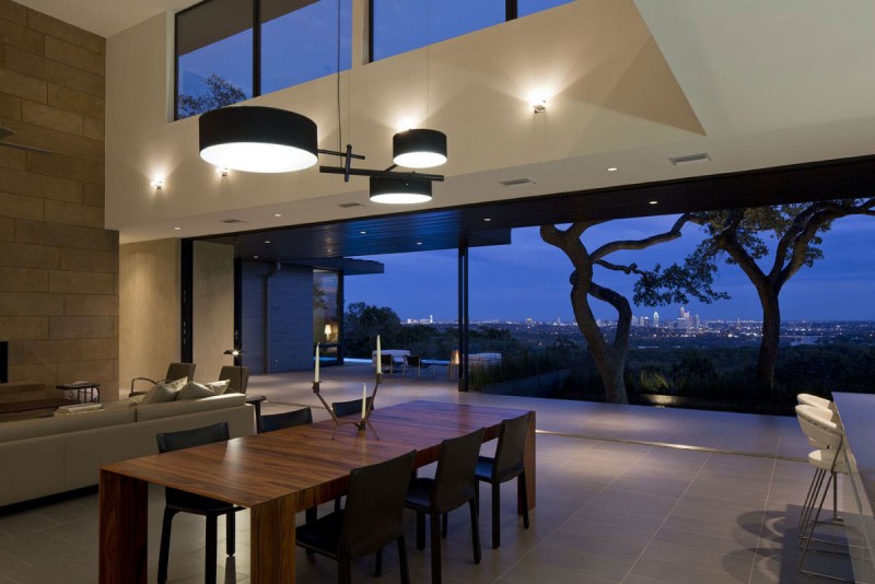 Pendant Lights Dining Sparkling Pendant Lights Above Wood Dining Table And Dark Chairs Dark Bed Sofa Glass Door Stone Wall In Skyline House Dream Homes Affordable Modern Prefabricated Home With Concrete And Glass Structures