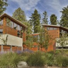 Sunset Point Colorful Splendid Sunset Point House With Colorful Flowers And Shrubs On Courtyard Horizontal Striped Outdoor Wood Wall Square Glass Window Dream Homes Sustainable Contemporary Home With Wood And Stained Glass Facade