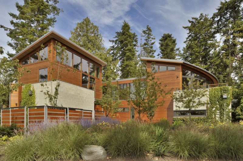 Sunset Point Colorful Splendid Sunset Point House With Colorful Flowers And Shrubs On Courtyard Horizontal Striped Outdoor Wood Wall Square Glass Window Dream Homes Sustainable Contemporary Home With Wood And Stained Glass Facade