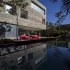 Terrace Space House Striking Terrace Space In Modern House Design Exterior Completed With Pink Modern Outdoor Sofa Furniture Decoration Ideas Dream Homes Stunning Modern Home With Glass Facades And Infinity Swimming Pools