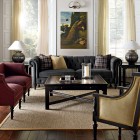 Black Sofas Living Stunning Black Sofas In The Living Room Facing Black Table Feat Candle That Red And Taupe Chairs Completed The Room Decoration Dramatic Yet Elegant Bold Black Sofas For Exquisite Interior Decorations