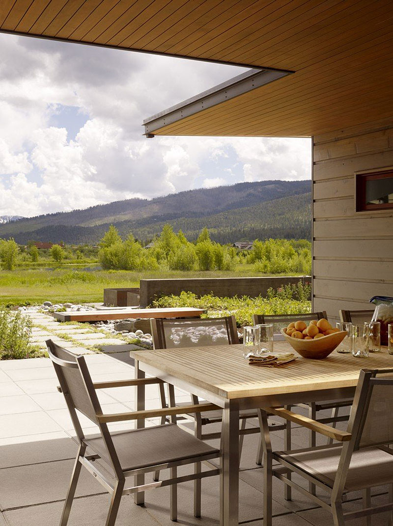 Centerpiece On Table Stunning Centerpiece On Wooden Dining Table Completed With Gray Dining Chairs On Gray Tiled Floor Of Peaks View Residence Architecture  Beautiful Contemporary Home With Outdoor Dining Room And Semi-Open Terrace